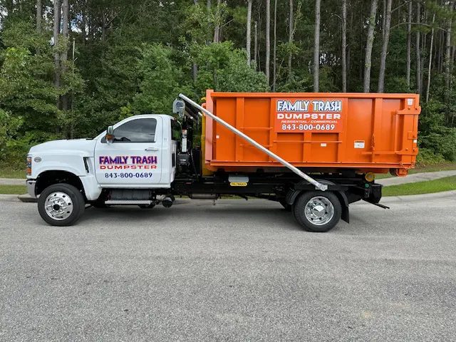 Family Trash 13-yard dumpster on a residential driveway in Charleston