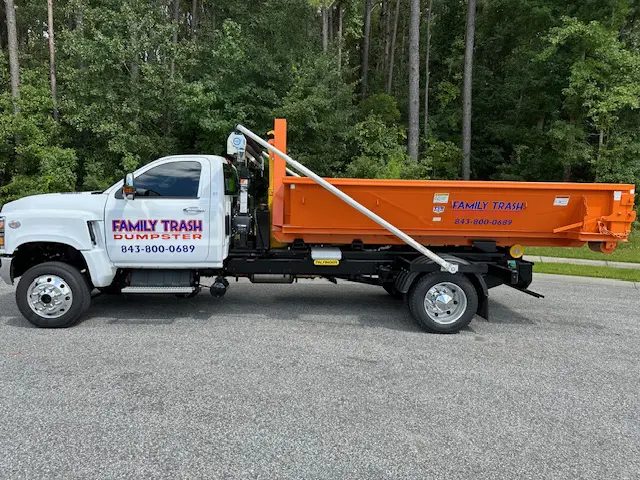 Family Trash 7-yard roll-off dumpster, the low can for concrete and dirt